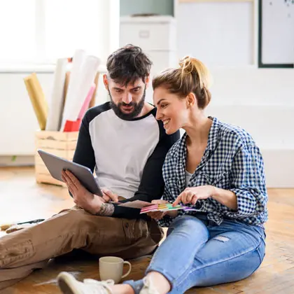 Man and woman looking at color samples