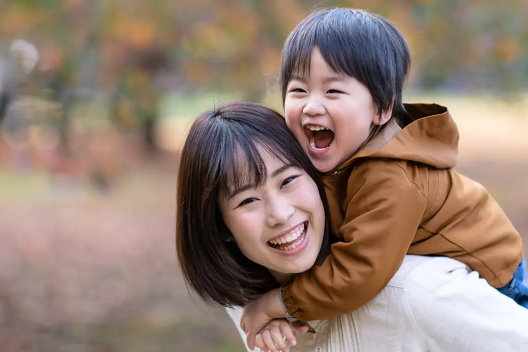 Mother and son on walk outdoors